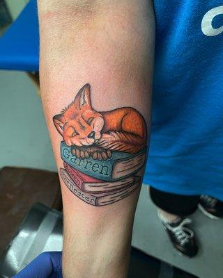 Fox on books tattoo