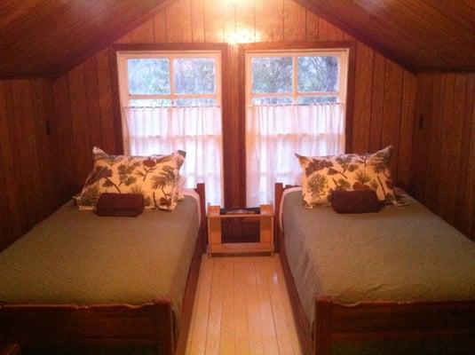 Twin beds upstairs in the loft.