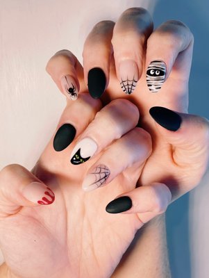 Dip manicure with hand painted design