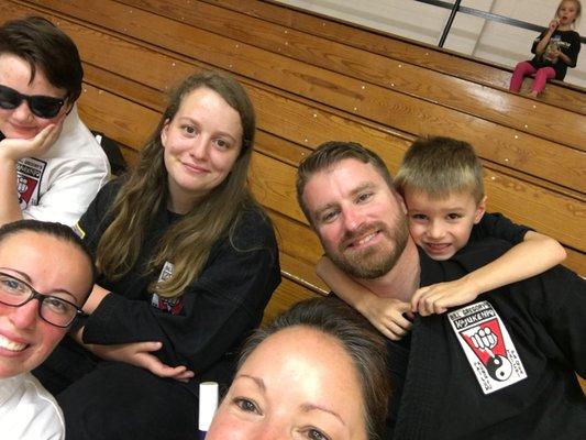 Sifu Rob, Si Hing Hannah Mrs. Rowe and Mr. Rowe at a martial arts school tournament