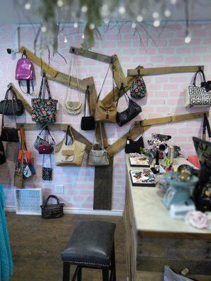 Name brand purses like Michael Kohrs, Coach, Vera Bradley, Vince Camuto, and many more!