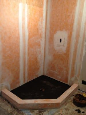 Schluter system Kerdi walls and custom mortar neo-angle pan