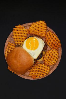 Our Detroiter Burger comes topped with american cheese, mozzarella cheese, a fried egg, and your choice of toppings!