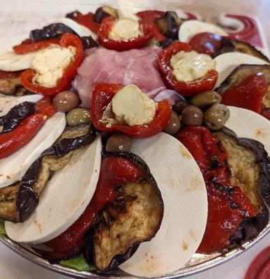 Fresh mozzarella, grilled eggplant, roasted pepper and stuffed hot pepper platter