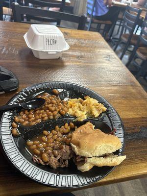 Bbq brisket sandwich, hash brown casserole, and baked beans