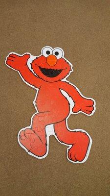 We may or may not have helped the kids put together the Elmo floor puzzle.