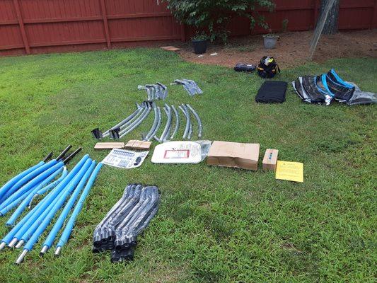 Trampoline assembly. Organizing all the parts before beginning