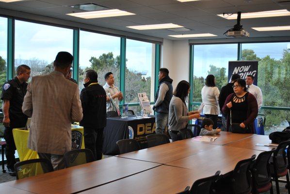 Law Enforcement Info Session - Students asking questions at each booth for Law Enforcement Opportunities