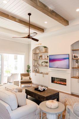 Fireplace buildout to fit the space. Cabinets are custom painted to meet customer needs.