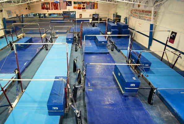 Designed for gymnasts to excel on bars, IGC has eight full sets of uneven bars, high and low strap bars, single rails, and drill stations.