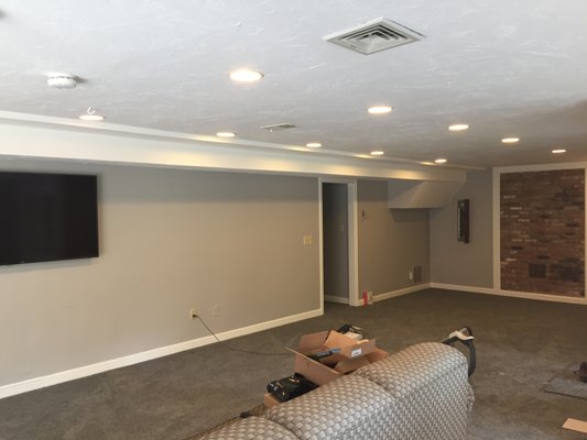 Basement renovation - new carpet, walls, paint, ceiling, lighting, shelving