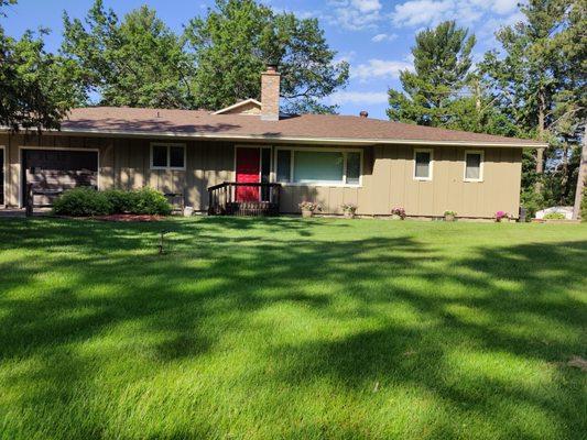 A massive boost to the curb appeal of this beautiful lakeside home