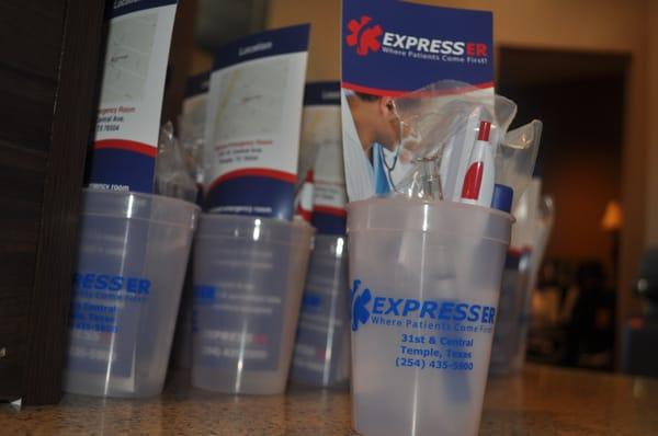 These fun cups are full of Express ER gear including a pen that looks like a syringe.