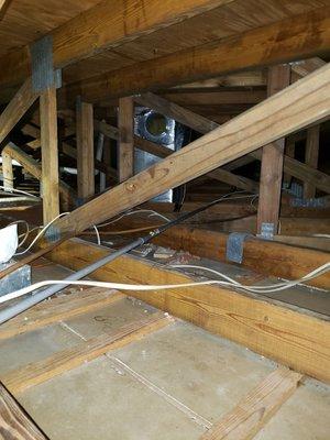 Attic after insulation has been removed