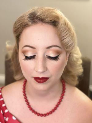 Red lips with vintage style hair and make up