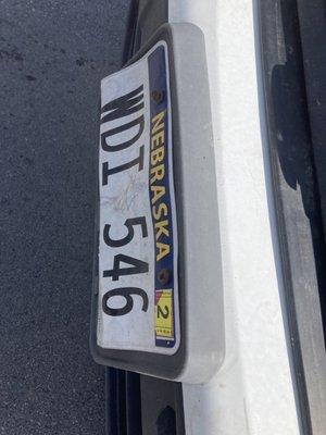 The license plate of the BDM vehicle that struck me. The driver at the scene of the accident claimed it had "bad breaks "