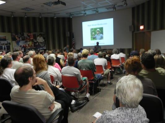 Crowd at a program inside the building