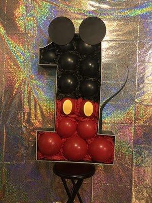 This is a 3 foot Mickey Mouse number one. Mosaic number