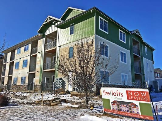 Apartment buildings that match the beautiful neighborhood that surrounds it.