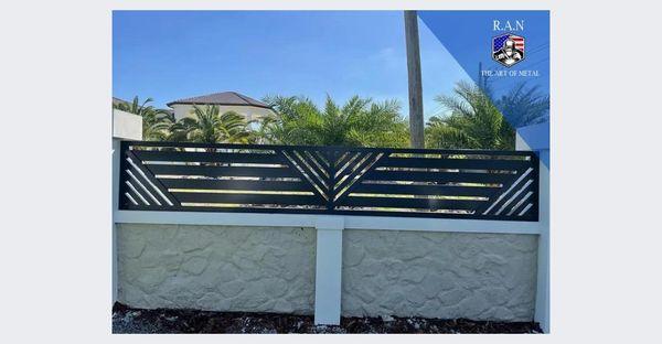 The combination of this metal and concrete fence design adds a distinctive style and security to your property. Our design merges the streng