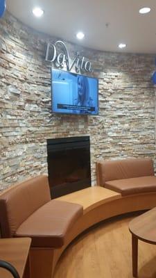 Beautiful waiting area with a fire place!