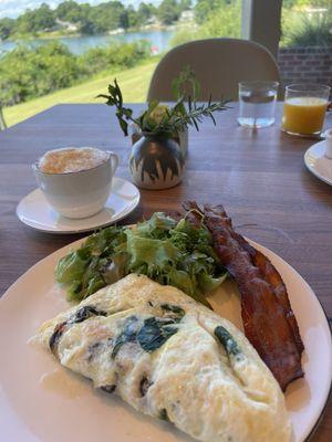 Egg white omlette (and the bacon I took from my husband's plate bc it is amazing!)