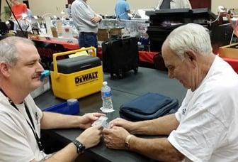 Jim (left) working a deal at a local show!