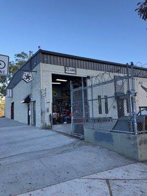 sidewalk view of the shop