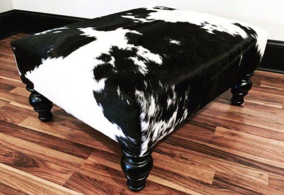 The Cow Pelt completely creates & constructs ottomans & footstools of their own designs & specializes in exotic Brazilian cowhide furniture.