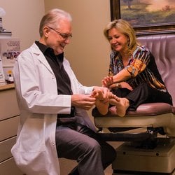 Dr. Reister helping a patient