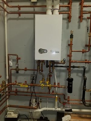 Weil McClain aquabalance combi boiler 
High efficiency heating and hot water