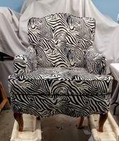 Fabulous pattern matching on this animal print chair! Completely rebuilt from the frame up like everything we do at Artistic Solutions!