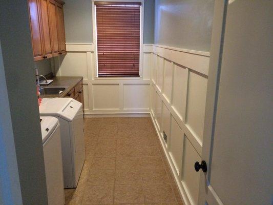 Carpentry work in laundry room- wainscoting walls with enamel finish