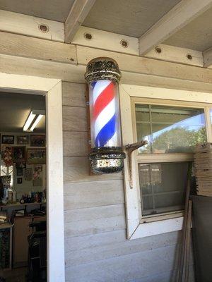 A barber who has a barber pole and it mean something