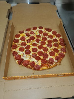 Thin crust pepperoni pizza