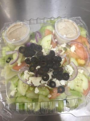 Creek salads - lettuce,tomato,cucumber,onion,black olives,feta cheese, Greek dressing