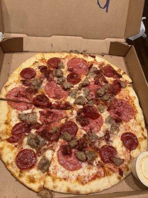 The Meatza! All-beef pepperoni, sausage, salami, and bacon.