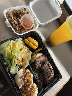 Popcorn chicken, Korean bbq bento box, and mango tea