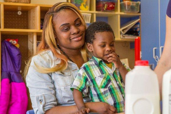 Mother and child at parent event.