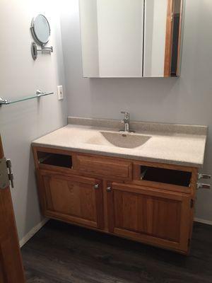 2017 Bathroom Remodel - New countertop, paint, flooring and accessories.