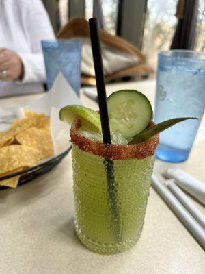 Cucumber margarita and chips with salsa