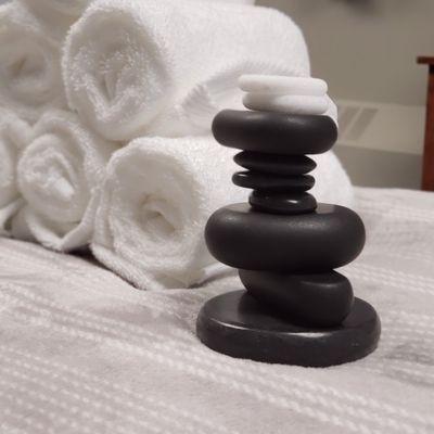 Hot stones or hot towel treatment,I offer both & they have great benefits.