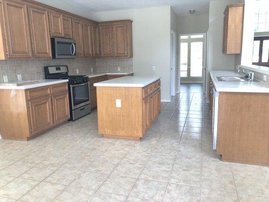 original view of kitchen cabinets before renovation