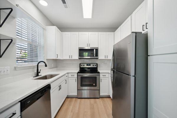 The kitchen in our renovated 2 bedroom, 2 bath unit has plenty of space for you to test out your culinary skills!