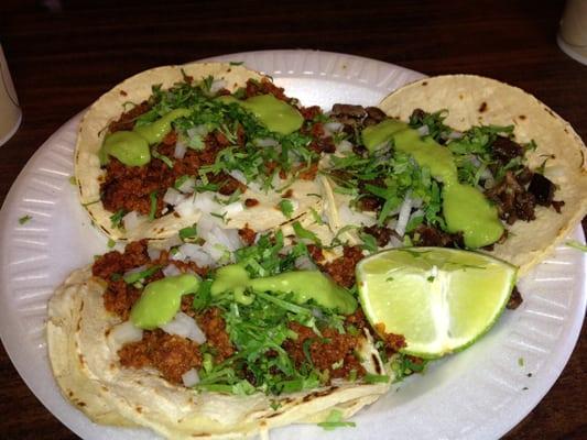 two chorizo tacos (left), one carne asada taco topped with homemade guacamole - all 3 for $4.50 (inc guac)