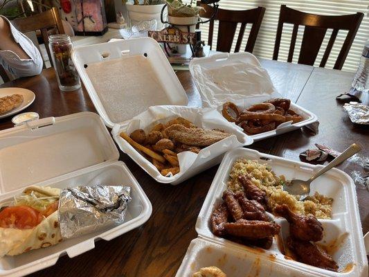 Steak gyro, tilapia and Cajun fries, spicy Korean hot wings and fried rice, and beer battered onion rings.