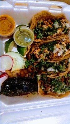 I got Carne Asada & Chicken Tacos! Super delicious & worth the price! Very well seasoned! Veggies were a plus. Spicy & Verde salsa. Yummy!