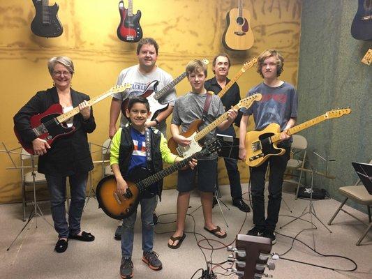 Archer Guitar School students posing w/ Instructor