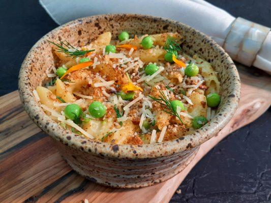 Truffle mac and cheese,  Vegetarian With aged cheddar, peas and herb breadcrumb