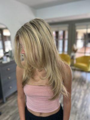 Beachy blonde highlights with a layered Haircut